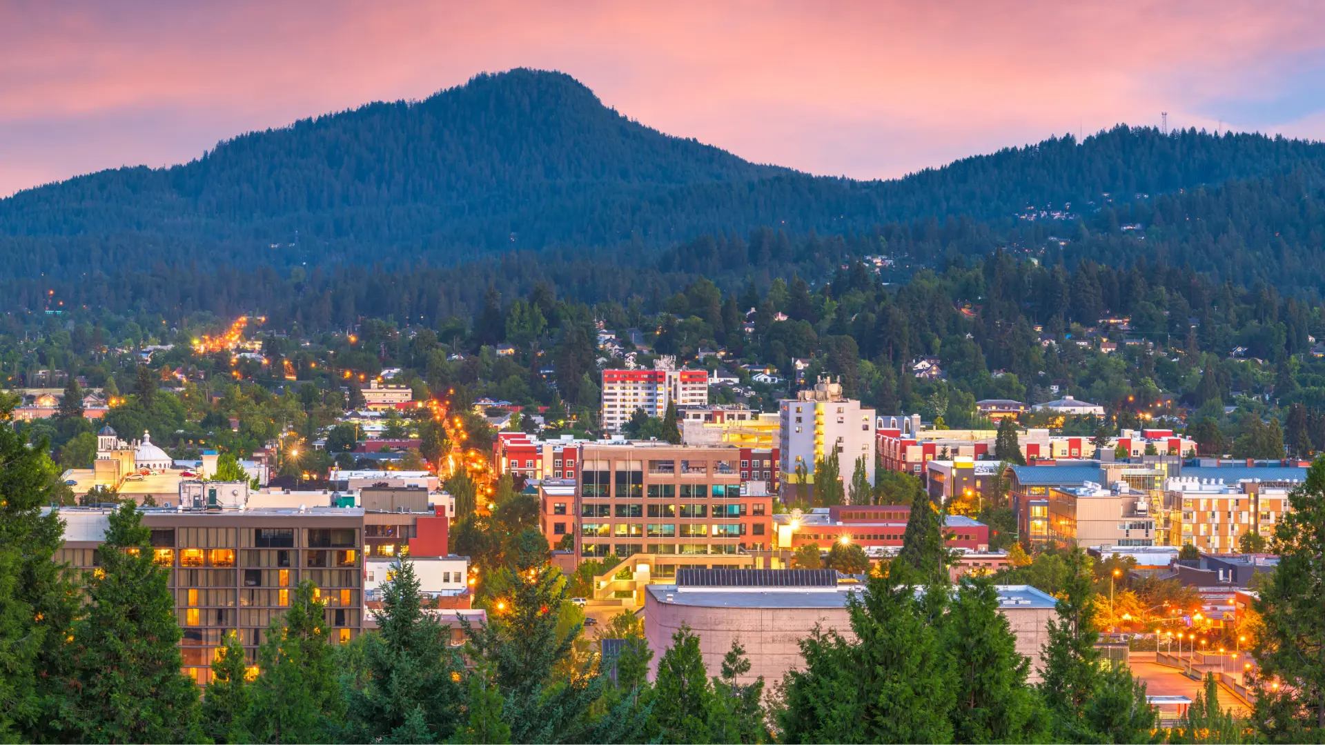 Eugene skyline at twilight with Spencer Butte in the distance