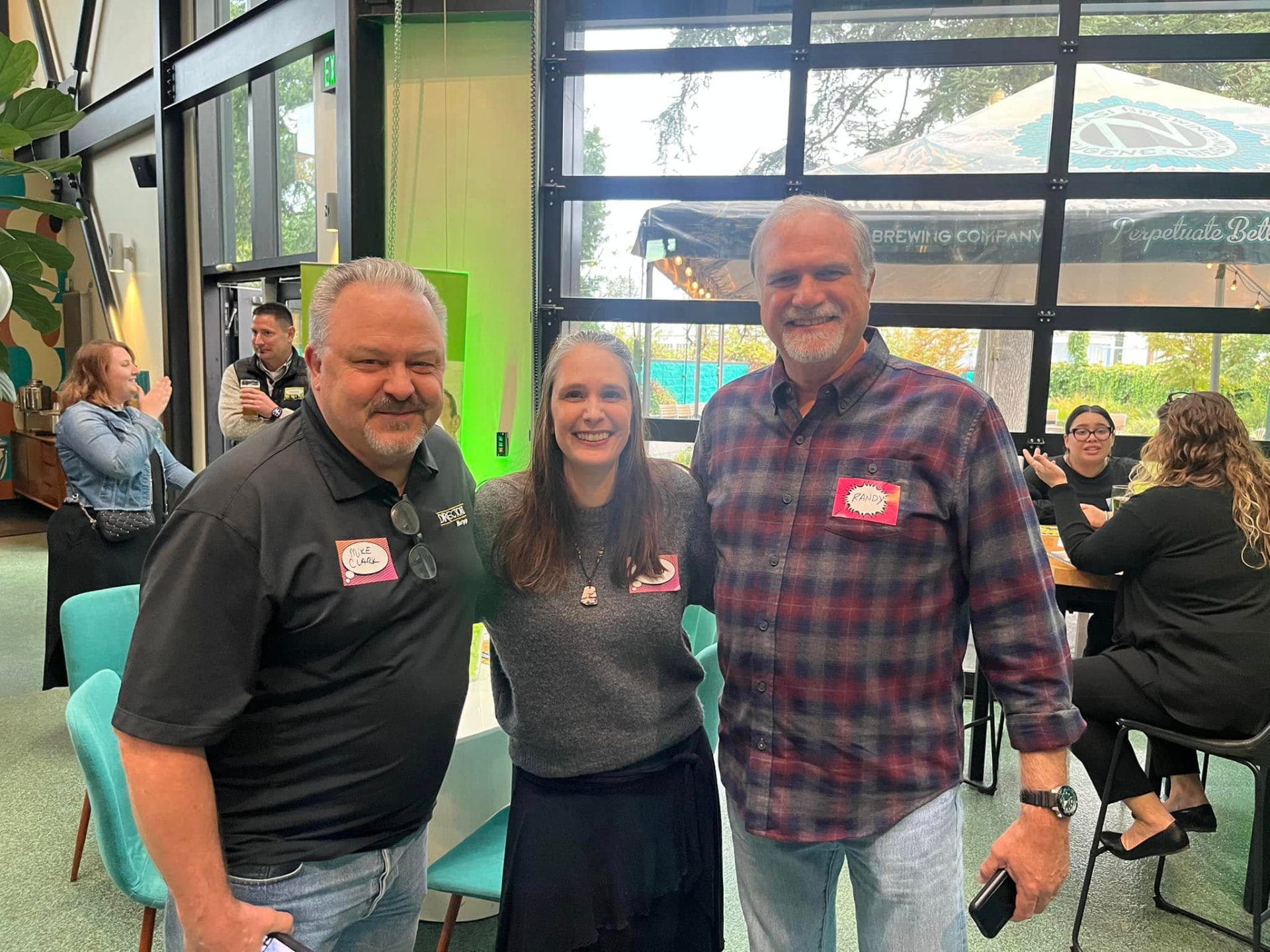 Mike Clark with neighbors at a local Eugene community gathering